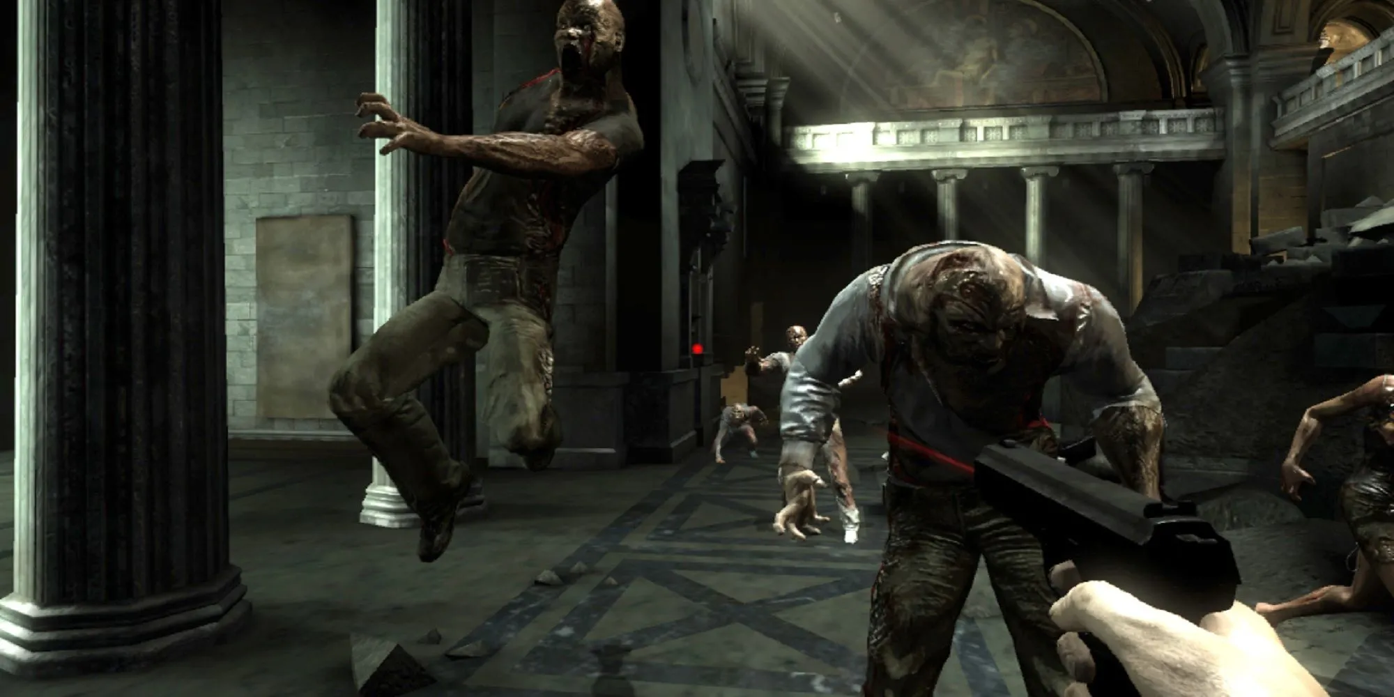 Cảnh chiến đấu trong game Alone in the Dark 2008 với nhân vật chính và quái vật