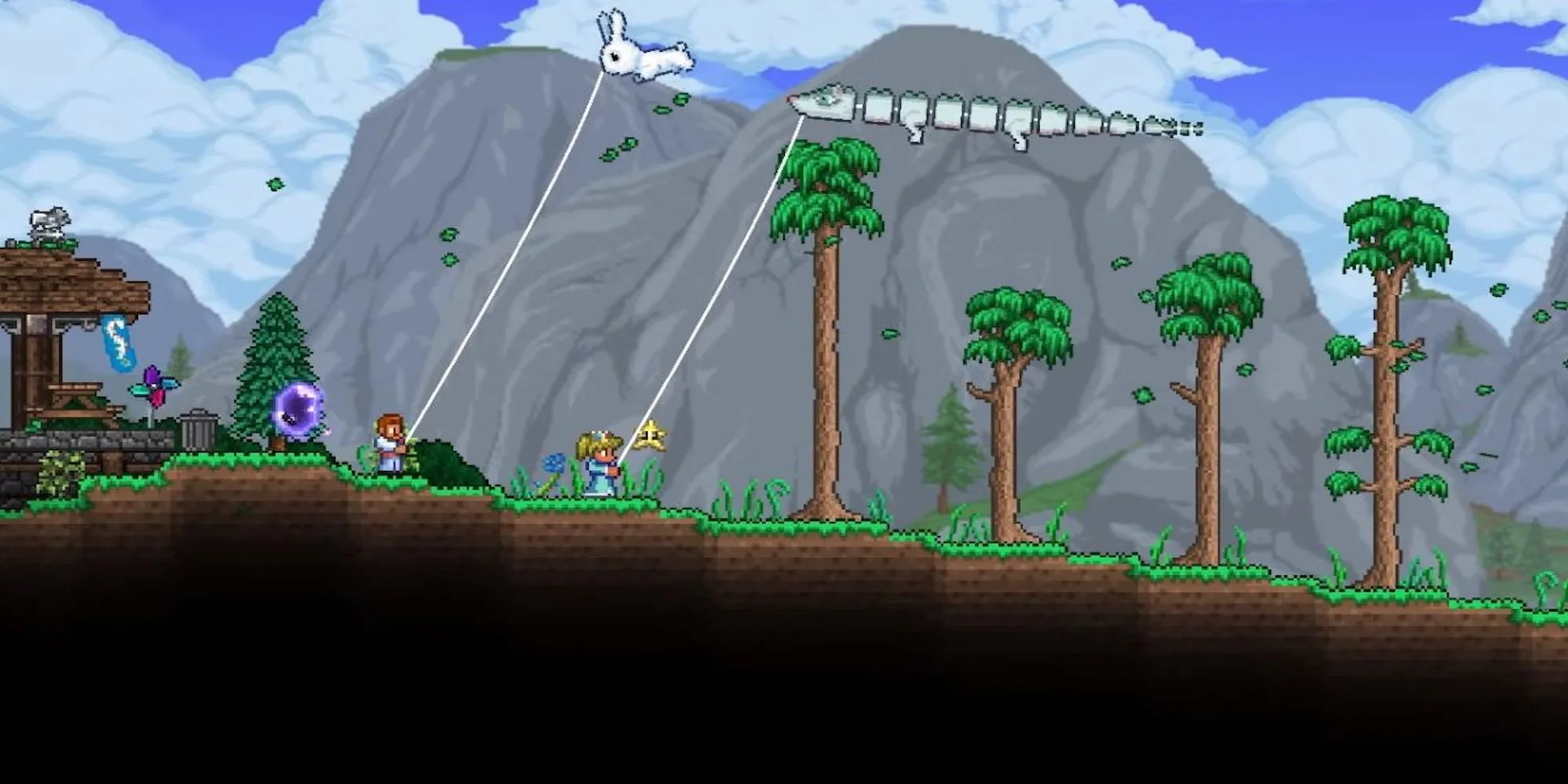 Hai người chơi Terraria cùng nhau thả diều trong một thế giới pixel đầy màu sắc
