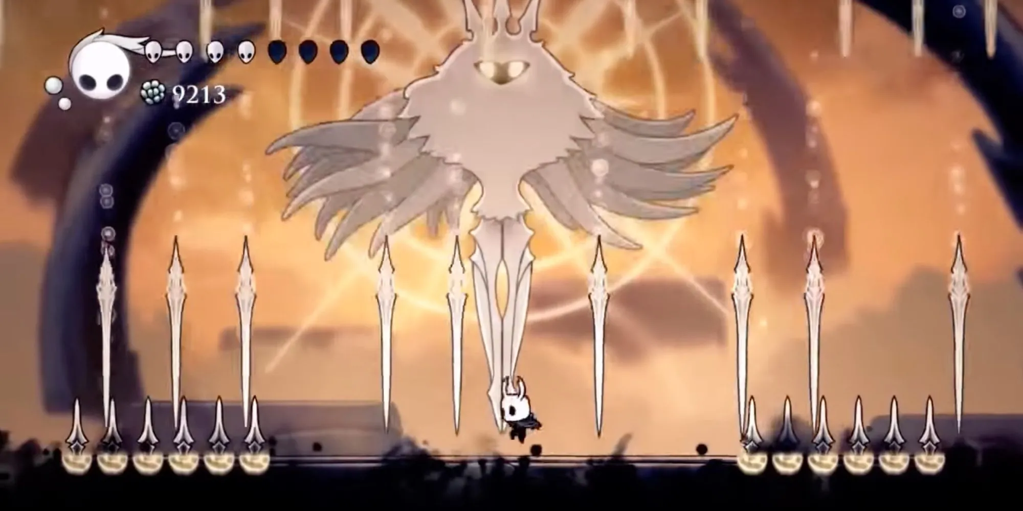 Hiệp sĩ Hollow Knight đối đầu với trùm cuối Radiance rực rỡ