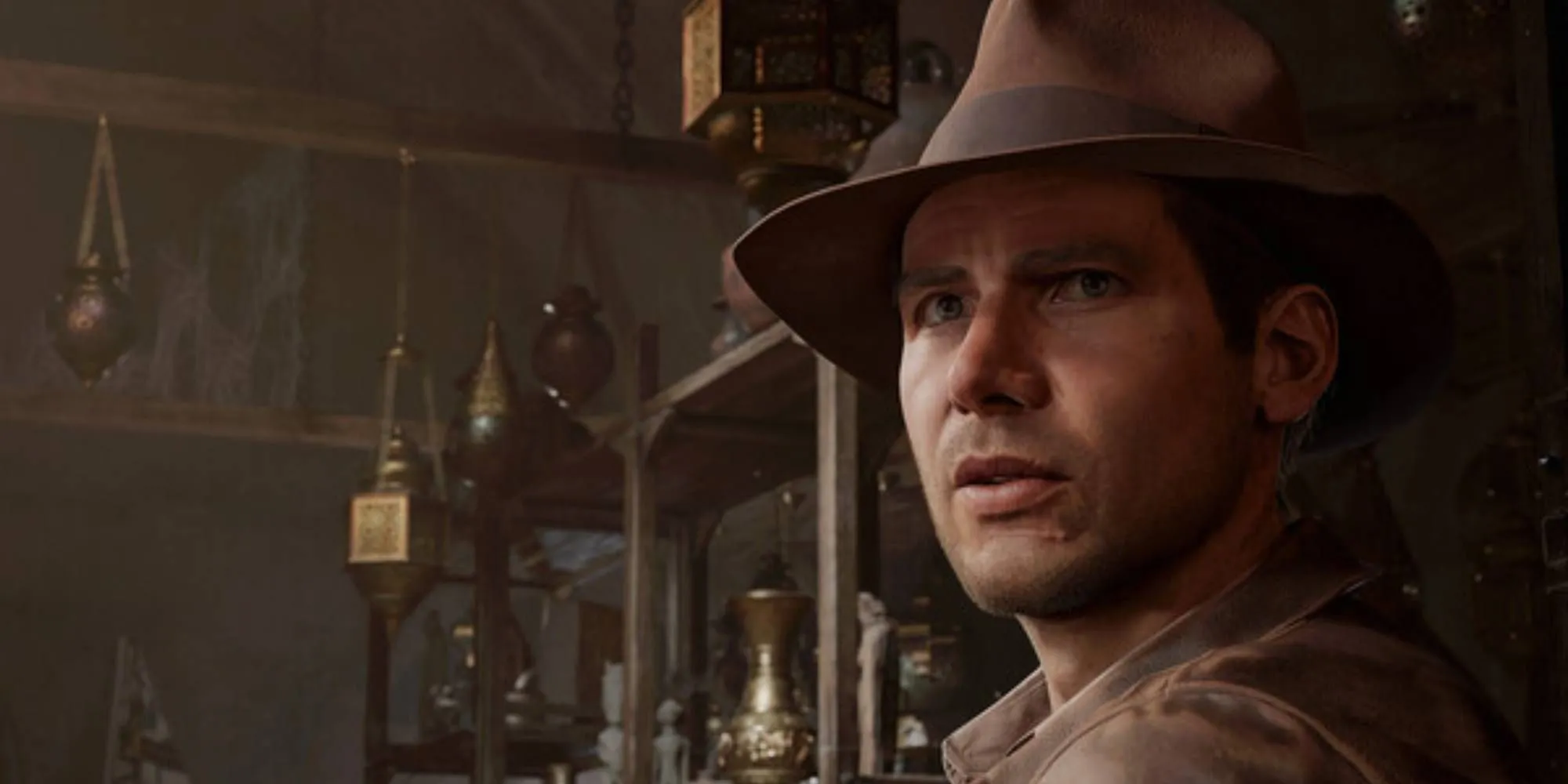 Hình ảnh Indiana Jones đang thận trọng tiến vào một hầm mộ tối tăm, trên tay cầm đuốc soi đường trong The Great Circle.
