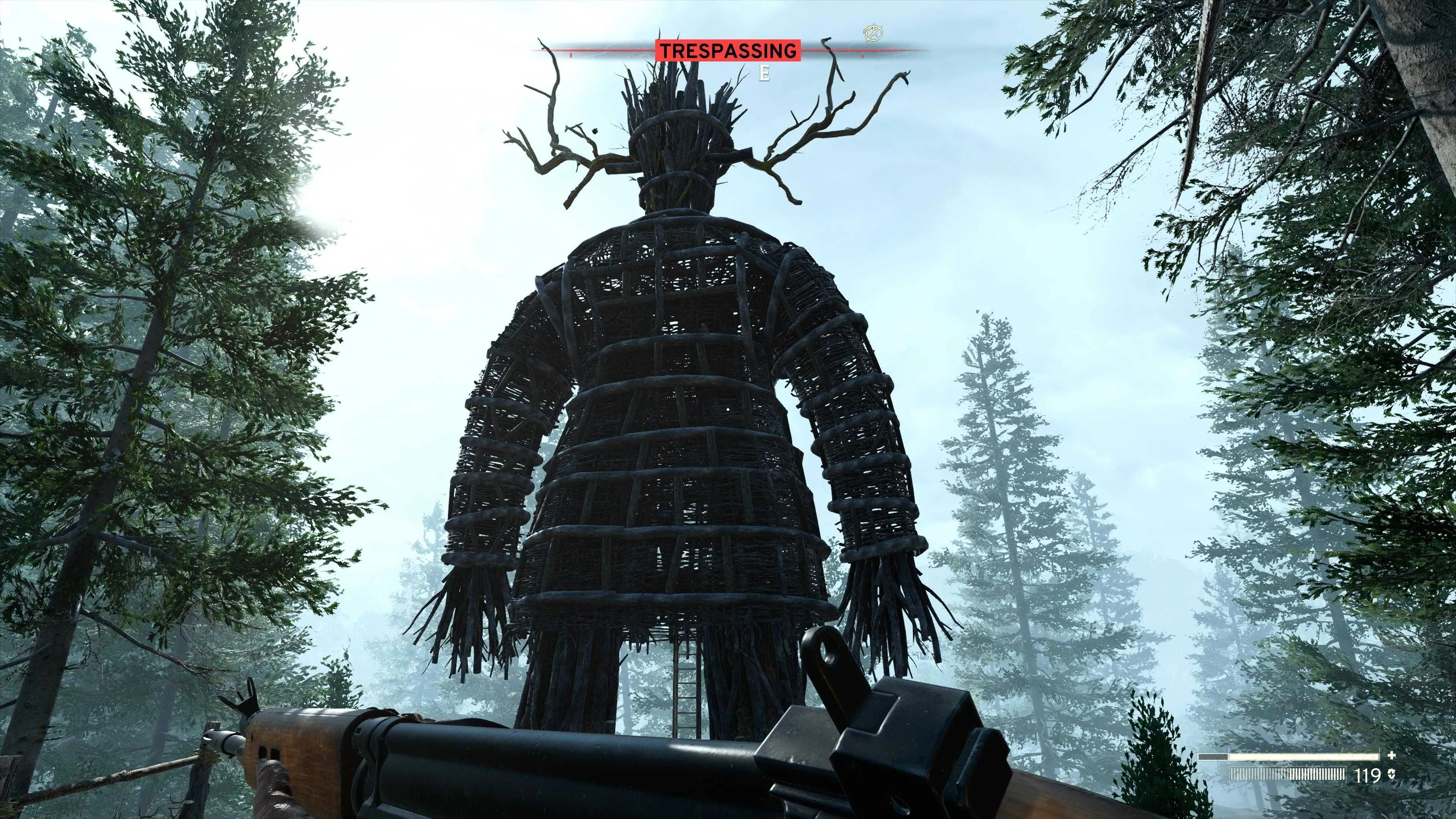 Hình nộm Wicker Man trong một cảnh game Atomfall