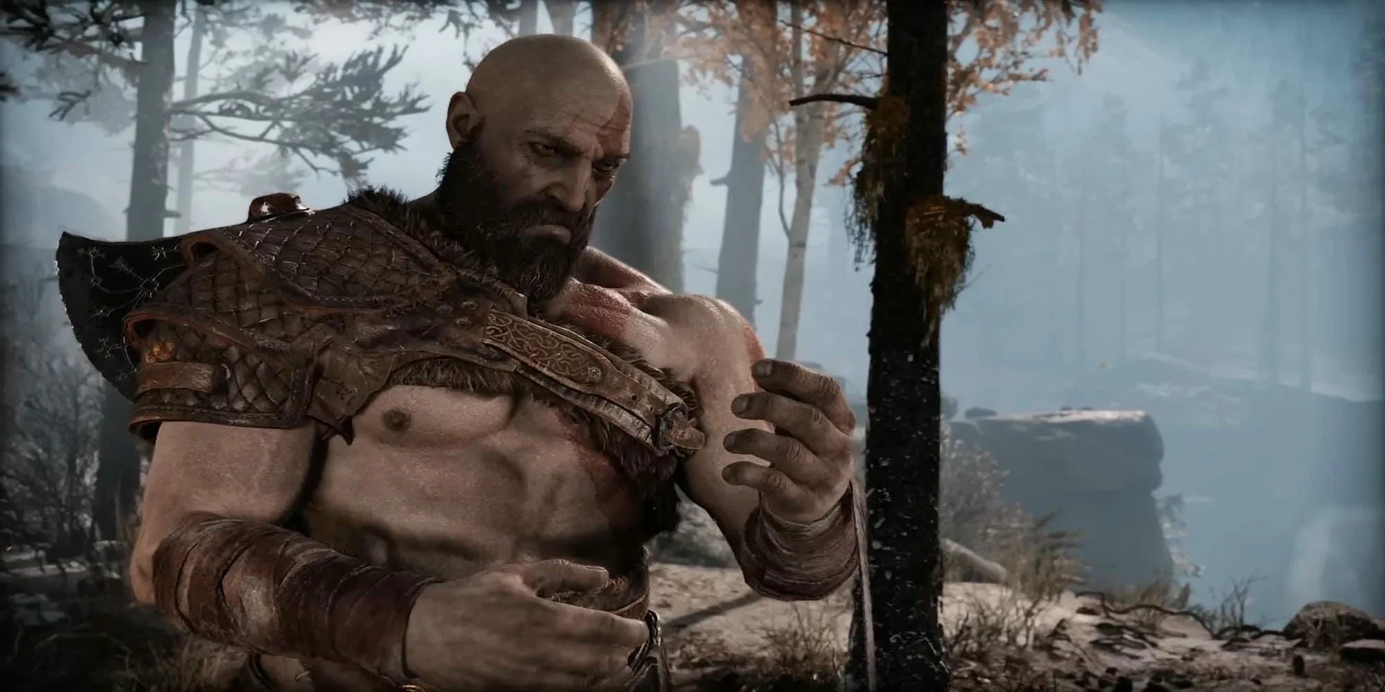 Kratos và Atreus chèo thuyền khám phá các cõi trong God of War (2018), một ví dụ xuất sắc về game bán thế giới mở