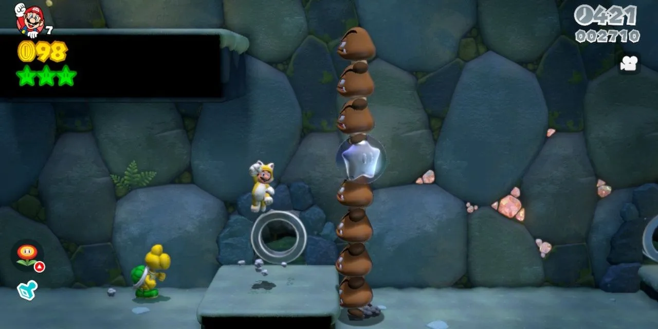 Mario trong bộ đồ mèo đang phiêu lưu qua một màn chơi đầy màu sắc của Super Mario 3D World