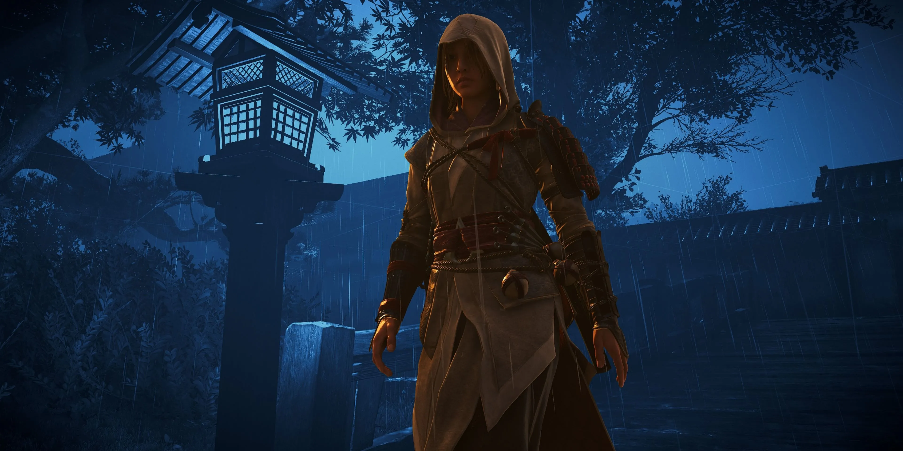 Naoe trong Assassin's Creed Shadows với trang phục shinobi và tư thế sẵn sàng hành động
