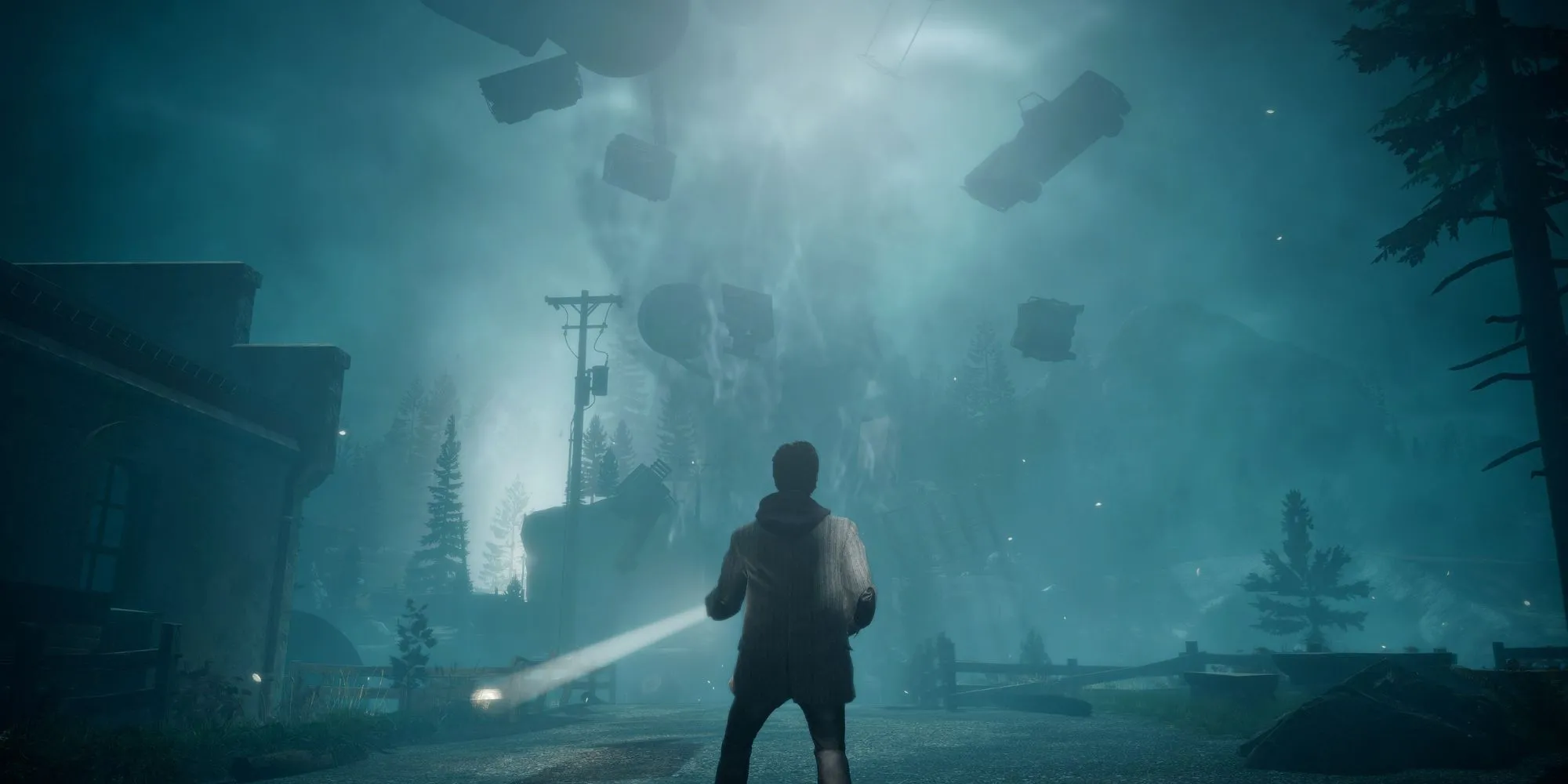 Nhân vật Alan Wake đứng dưới ánh đèn pin trong môi trường siêu nhiên đầy ma quái của game Alan Wake Remastered