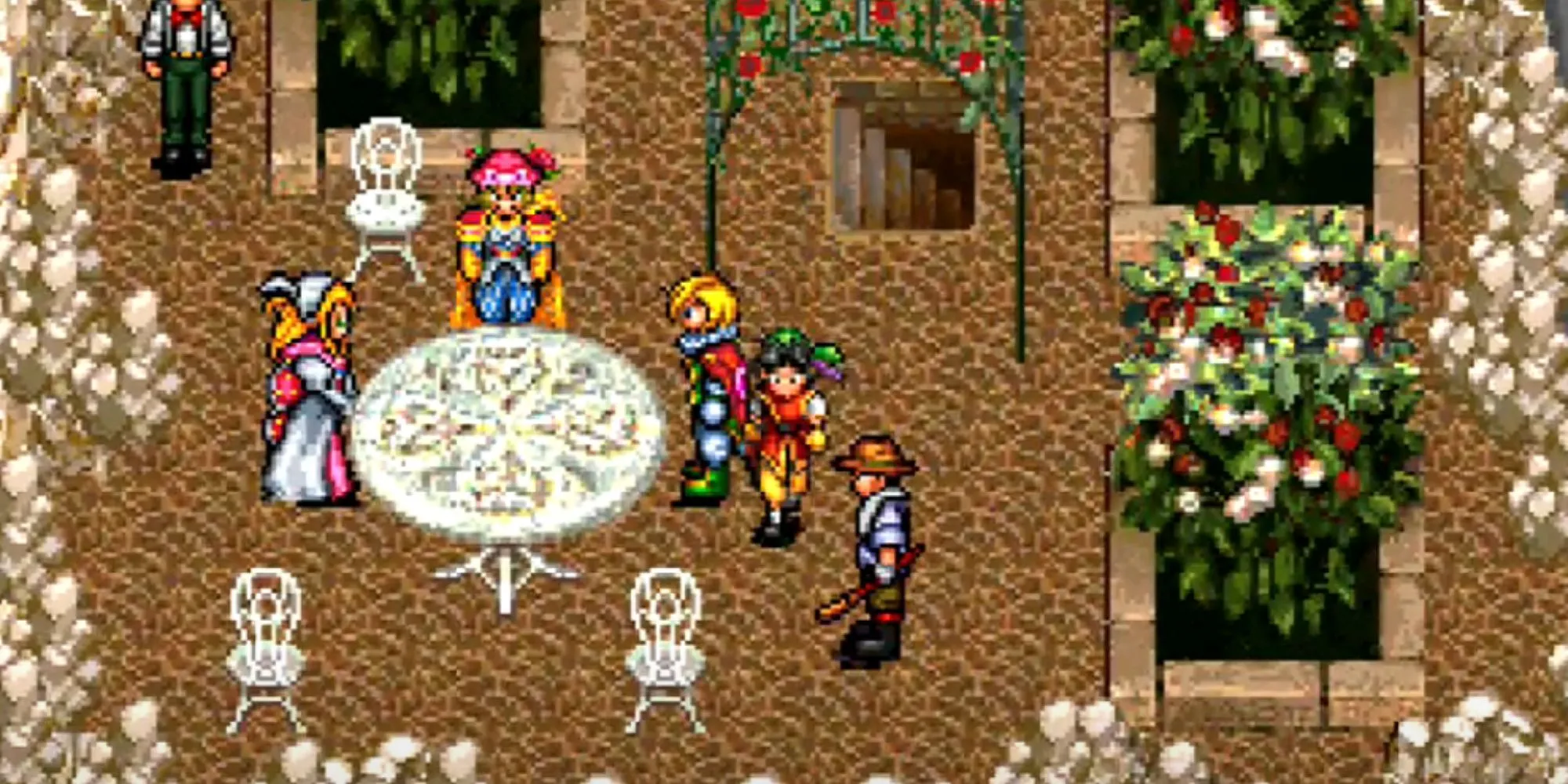 Các nhân vật Suikoden đứng quanh một bàn