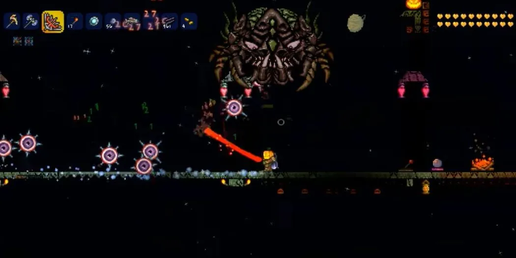 Game thủ chiến đấu với trùm Ocram trong thế giới pixel của Terraria