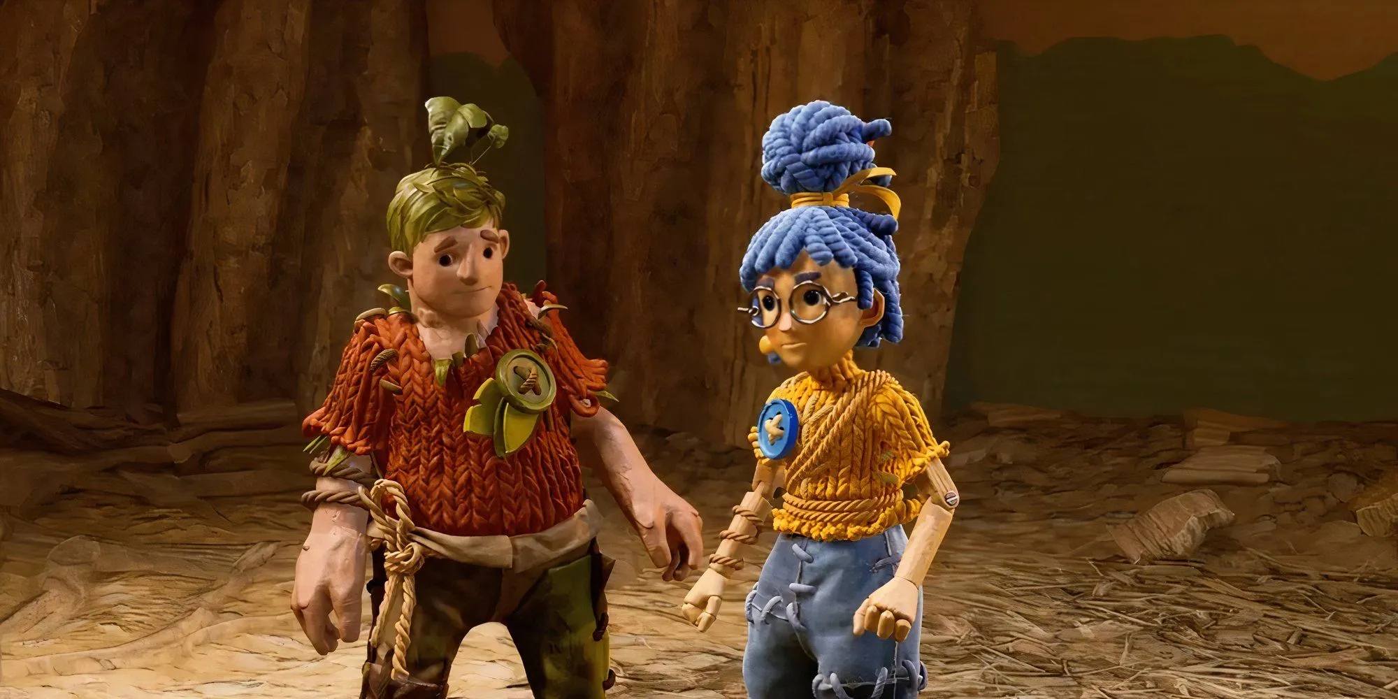 Hai nhân vật Cody và May, biến thành búp bê, cùng nhau khám phá thế giới trong game It Takes Two