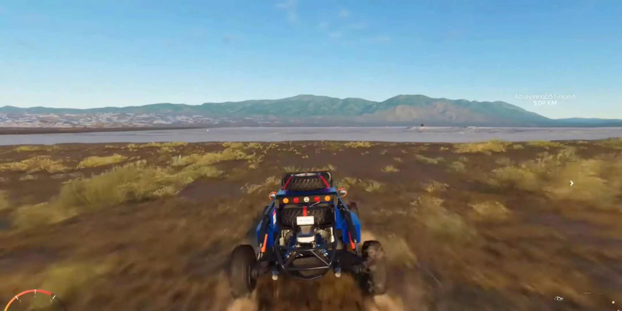Một chiếc xe buggy lao đi trên sa mạc rộng lớn trong The Crew 2