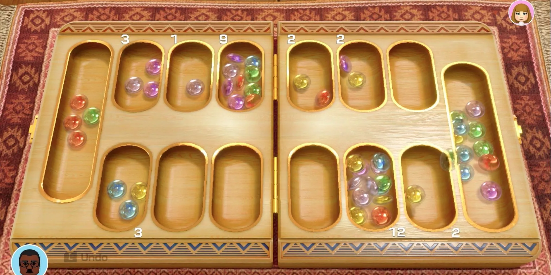 Screenshot của Clubhouse Games 51 Worldwide Classics, trong một trận Mancala