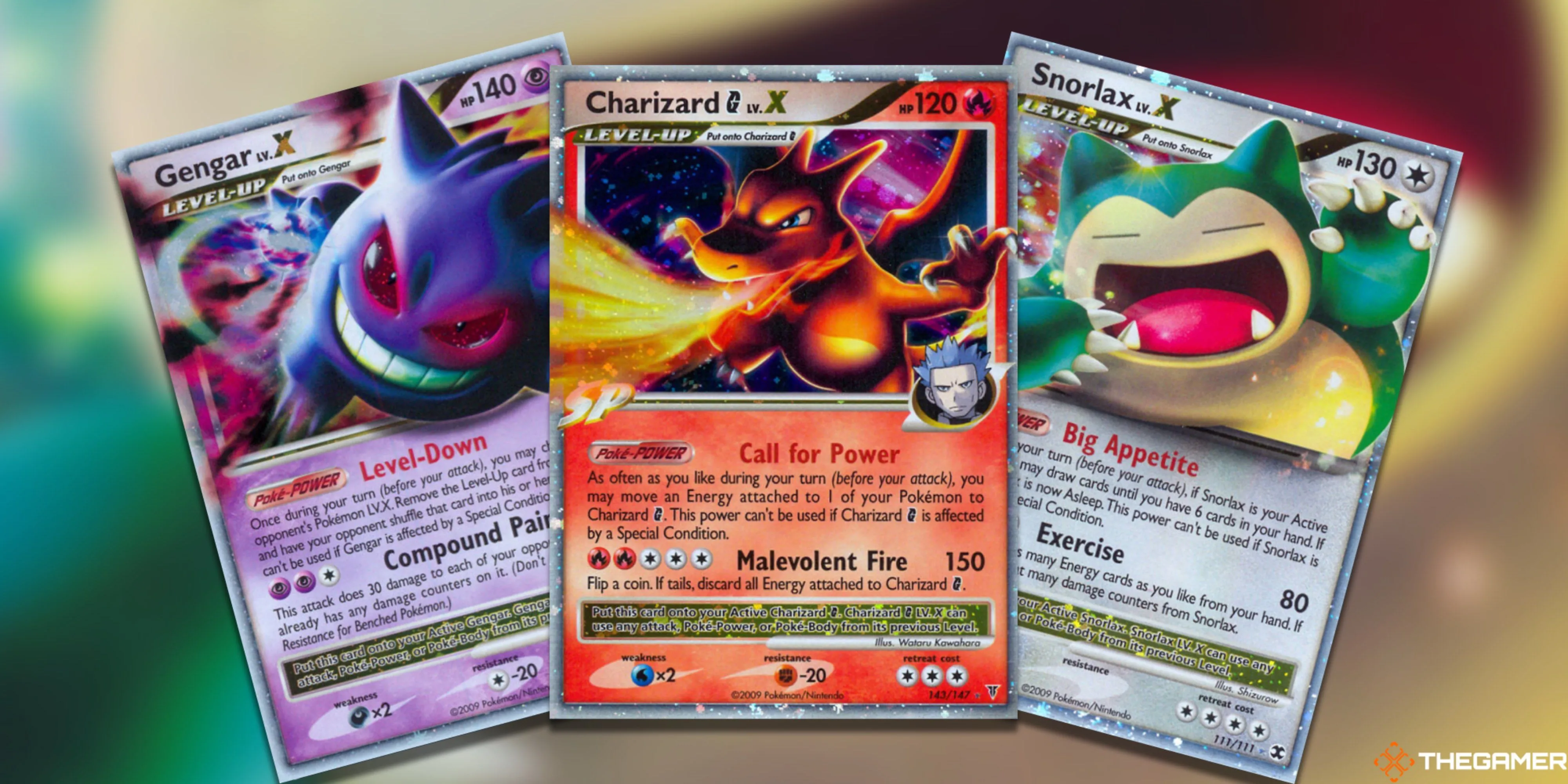 Ba thẻ Pokémon TCG LV.X hiếm bao gồm Gengar, Charizard G và Snorlax được xếp quạt ra.