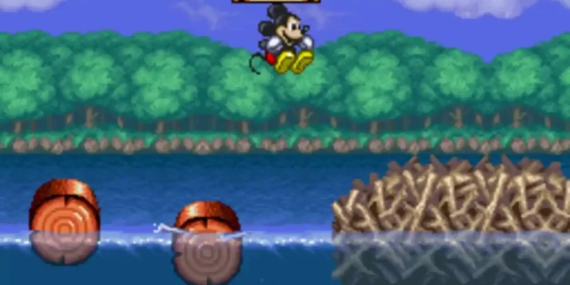 Mickey Mouse với trang phục phù thủy trong The Magical Quest trên SNES