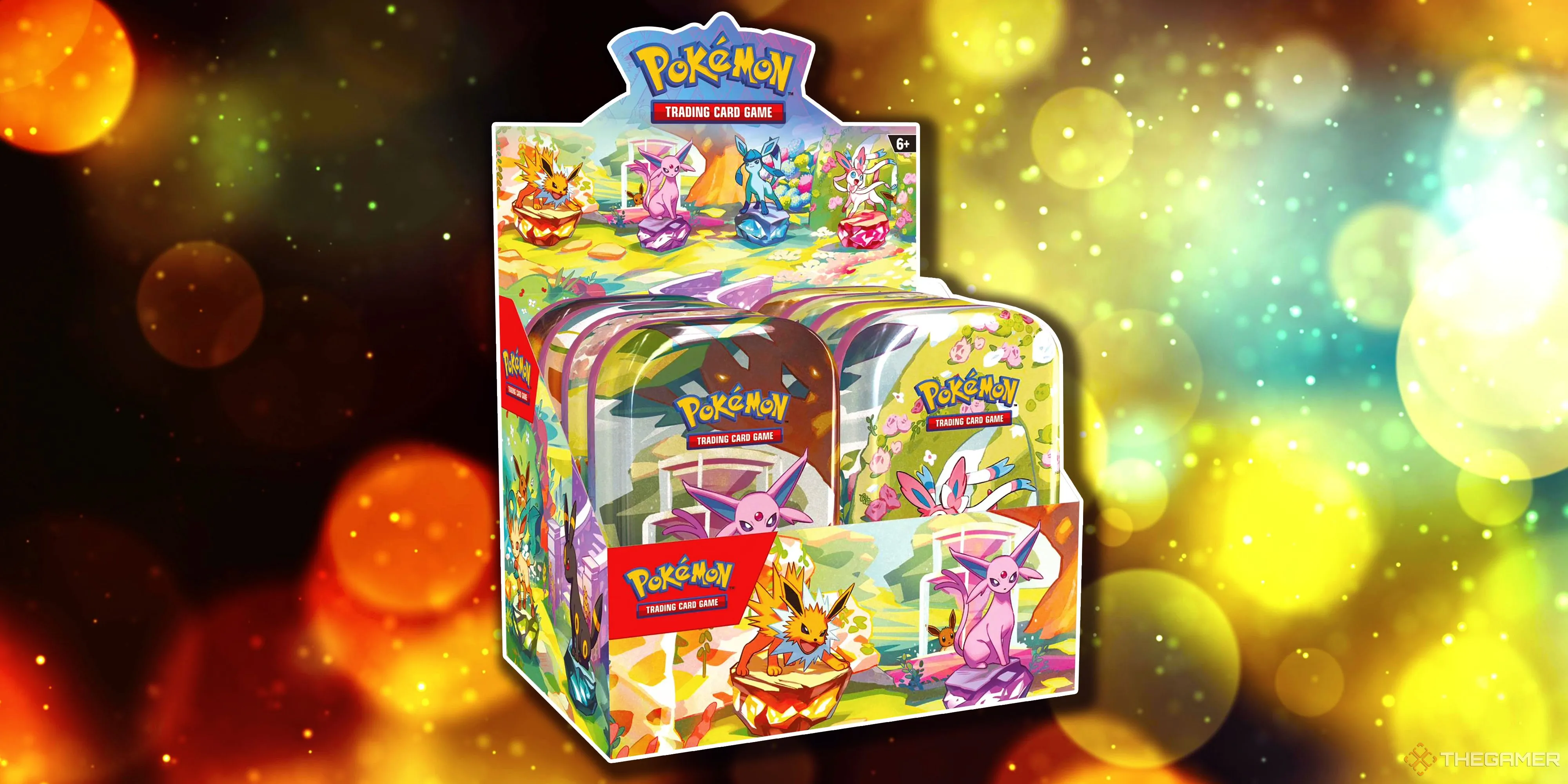 Mini Tin Display Pokemon TCG Prismatic Evolutions, trưng bày các Eeveelution nổi tiếng trên vỏ hộp.