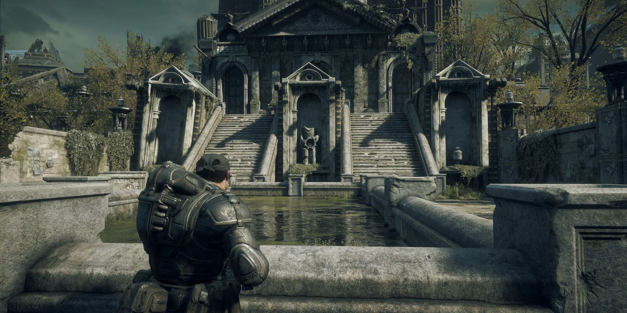 Một cảnh khám phá môi trường đổ nát, minh họa đồ họa được làm lại trong Gears of War Reloaded.