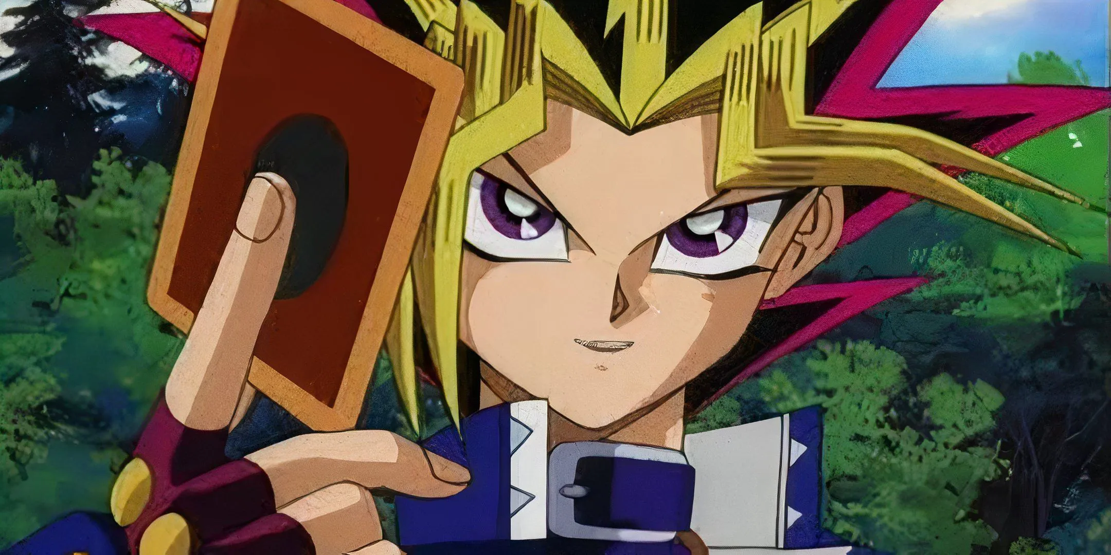 Yugi kiêu ngạo cầm một lá bài trong Yu-Gi-Oh! Duel Monsters